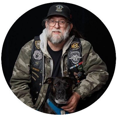 Gaetan Lacasse with his previous service dog nemesis